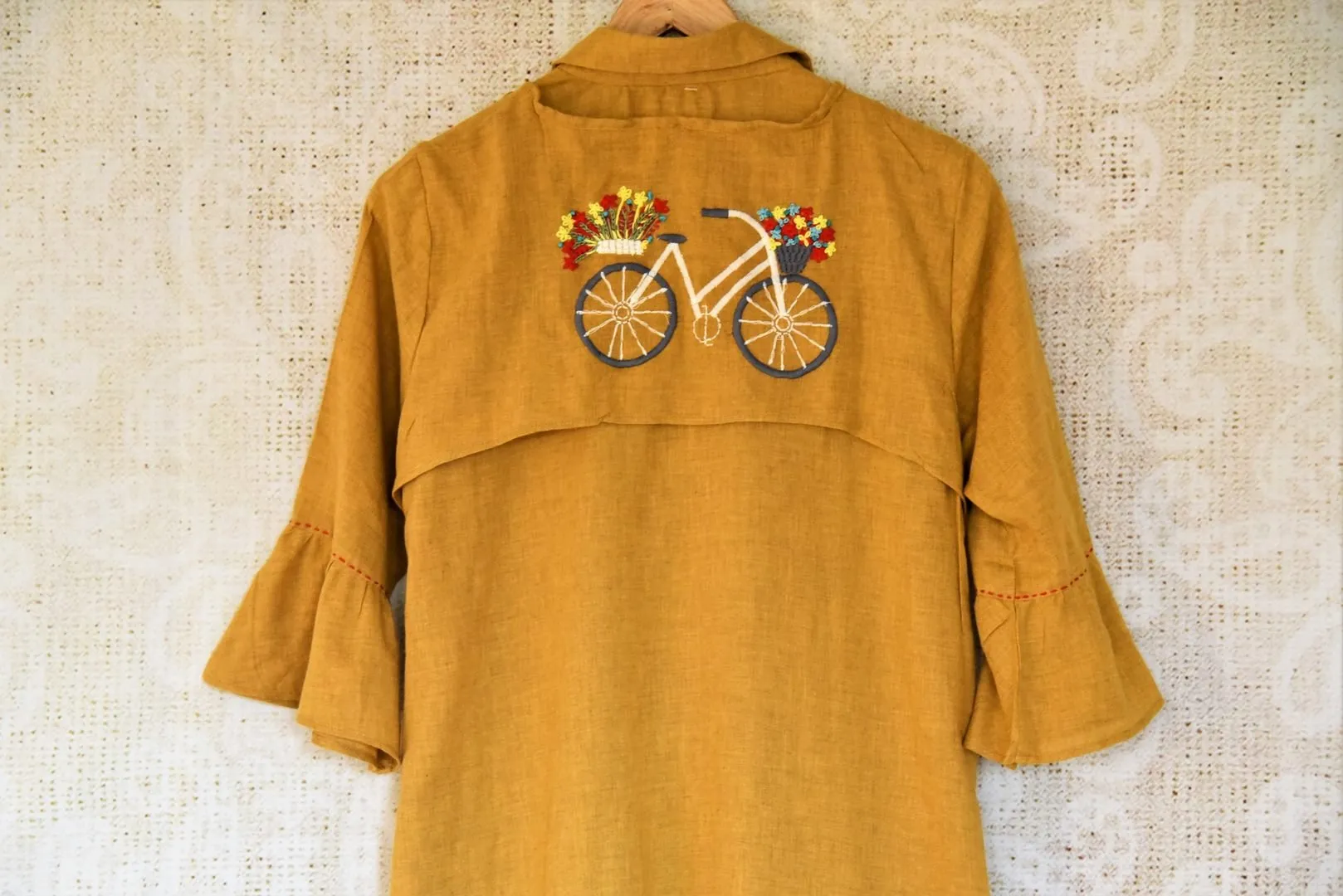 402758 Mustard Linen Dress with Embroidered Cycle Motif