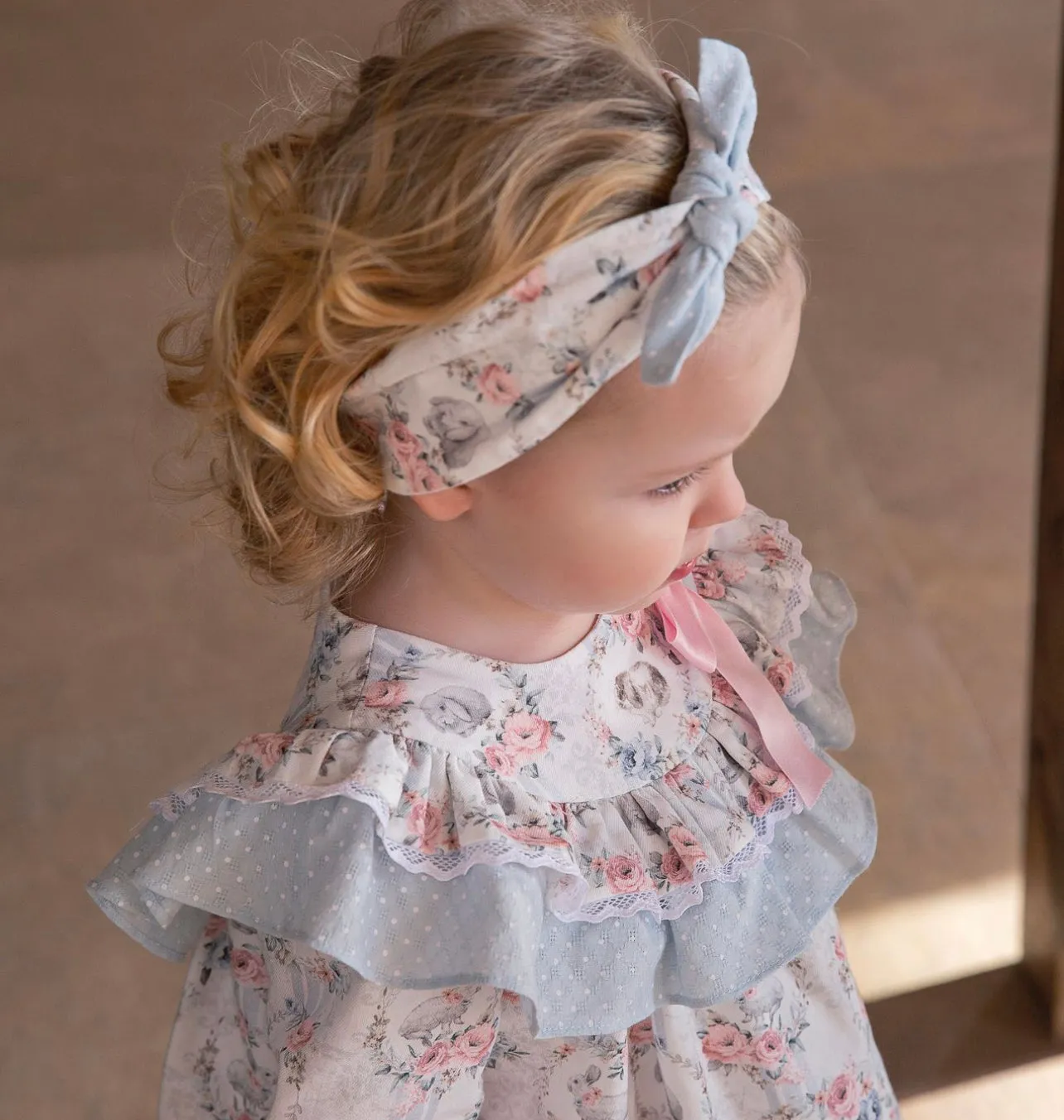 Beautiful Bunny Print Dress with Frill Details.