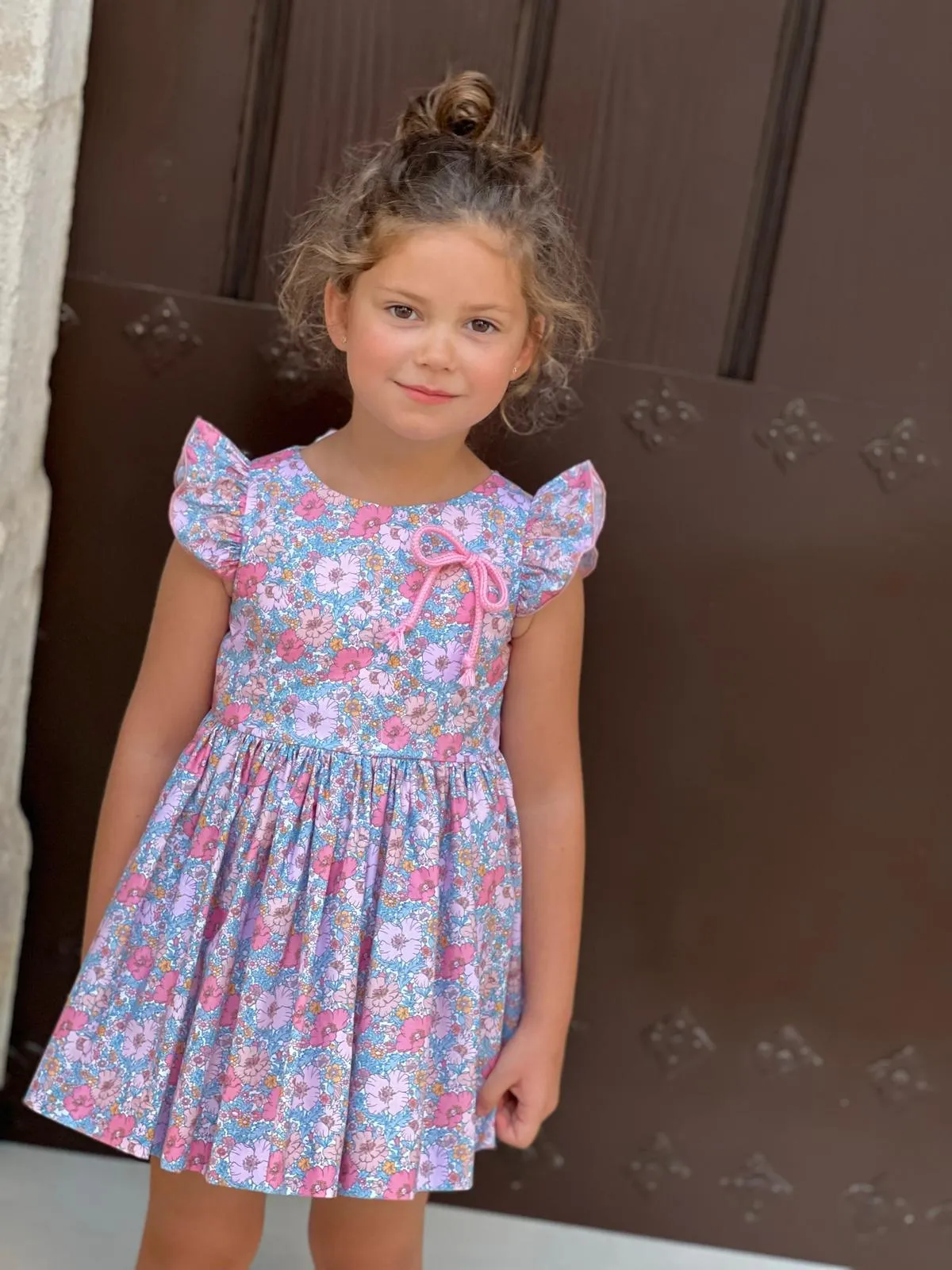 Beautiful floral print Dress with bow details