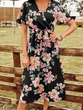 Discover the Charm: Black Surplice Dress with a Floral Print