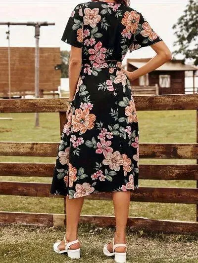 Discover the Charm: Black Surplice Dress with a Floral Print