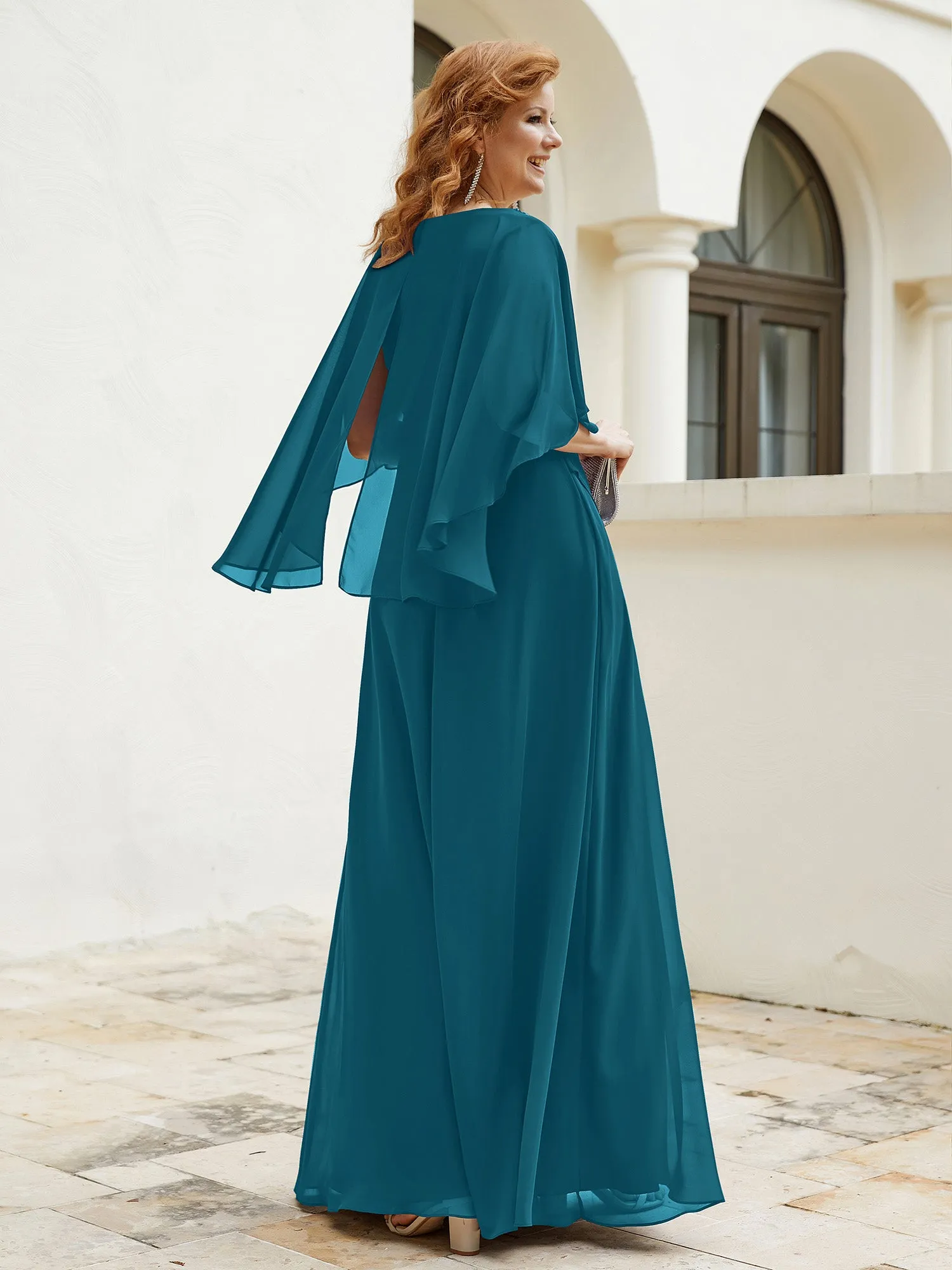 Dress Adorned with Beaded Elegance and Flutter Sleeves Ink Blue